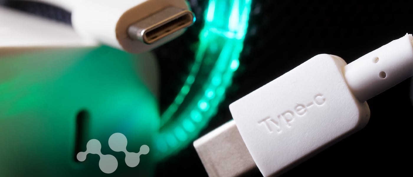 USB Type-C connectors with glowing teal data cable illustrating high-power USB PD connectivity and circuit protection